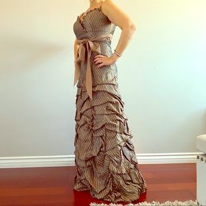 Evening gown or costume gown.